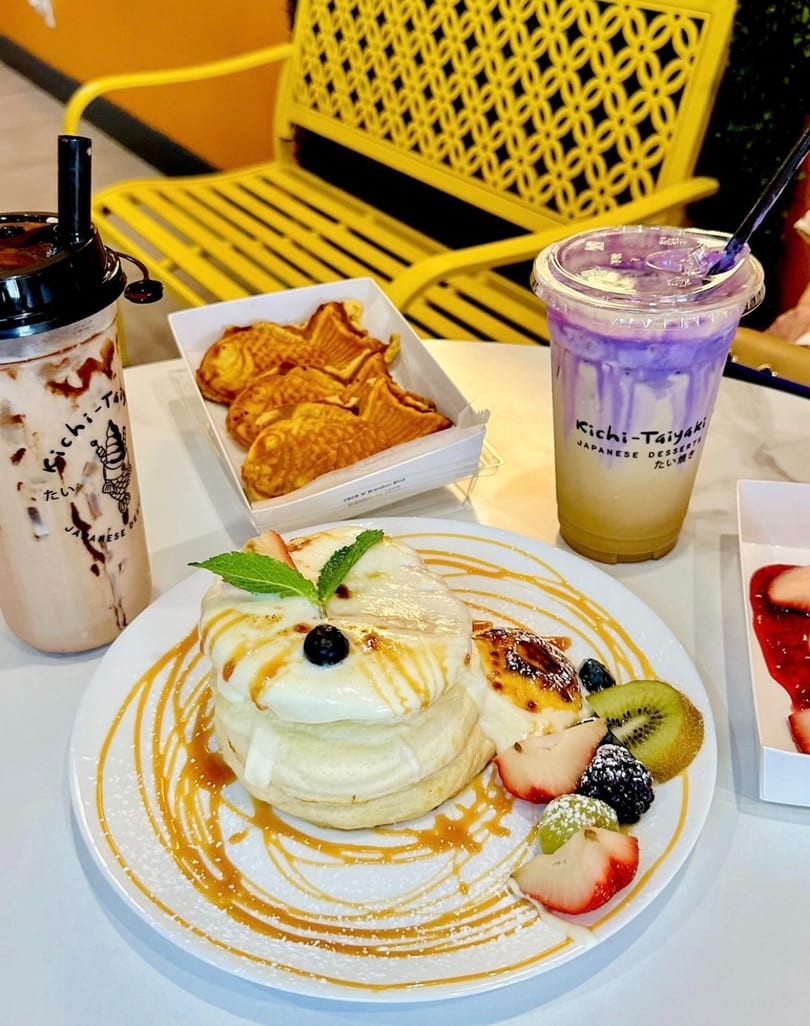 Delicious Kichi-Taiyaki Japanese desserts including fluffy pancakes, taiyaki, and two beverages.